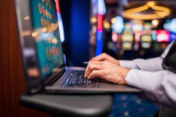 A person using their device against a moody casino-themed background, illustrating the smooth re-entry process at BDTLJ.